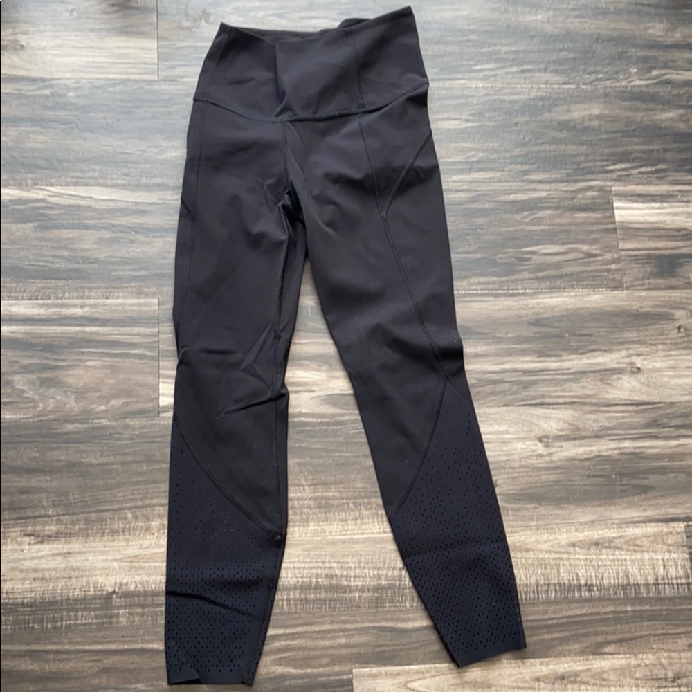 Black Lululemon perforated leg leggings